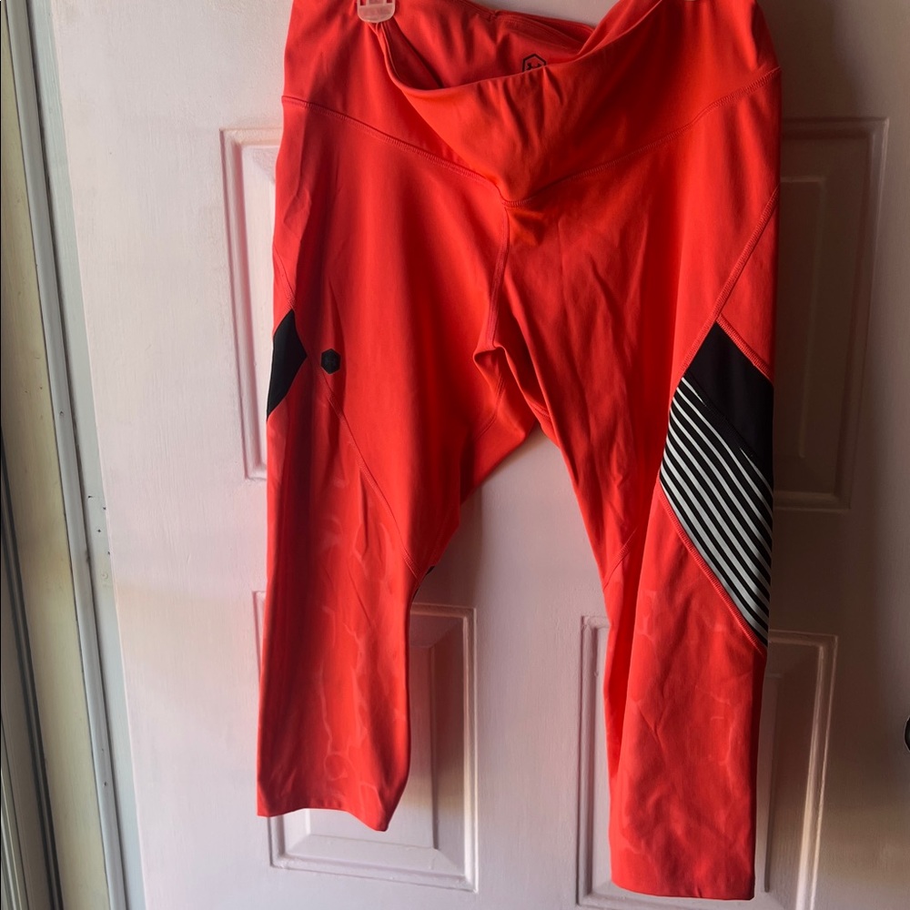 Under Armour Orange Leggings with Black and White Stripes